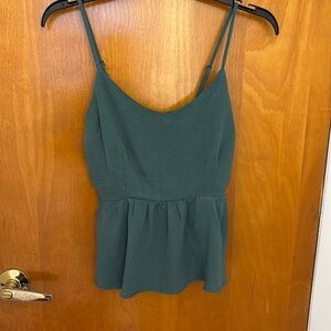 Emerald green babydoll flowy medium shirt.